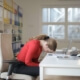 woman sleeping at desk
