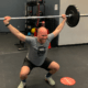 CPM member performing snatch